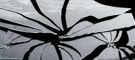 Black Broken glass, cracked glass on whiteの写真素材