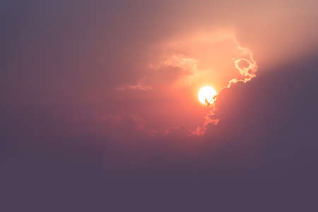 beautiful sunset light rays clouds backgroundの写真素材