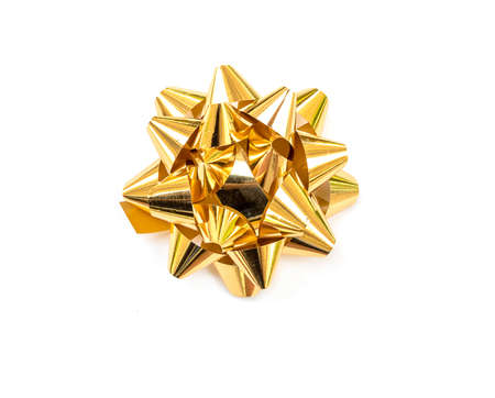 Gold ribbon bow on white backgroundの写真素材