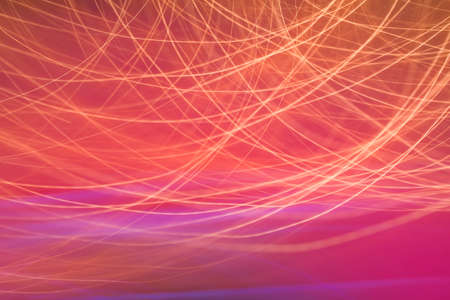 abstract red pink lines of light backgroundの写真素材