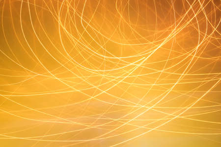 abstract gold lines of light backgroundの写真素材