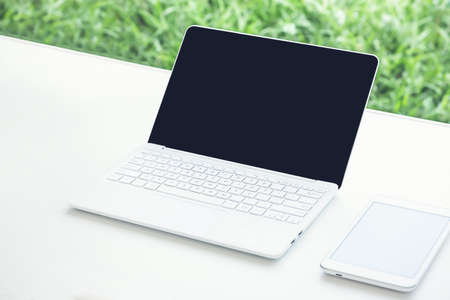 laptop computer on white table, White laptop computerの写真素材