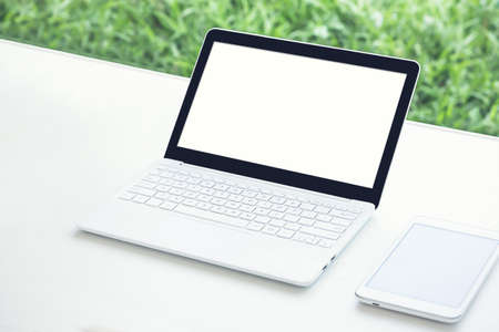 laptop computer on white table, White laptop computerの写真素材