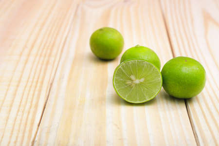 Fresh lime  on wood background