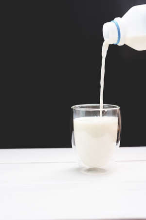 Milk into Glassの写真素材
