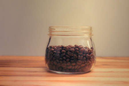 Coffe beans in bottleの写真素材
