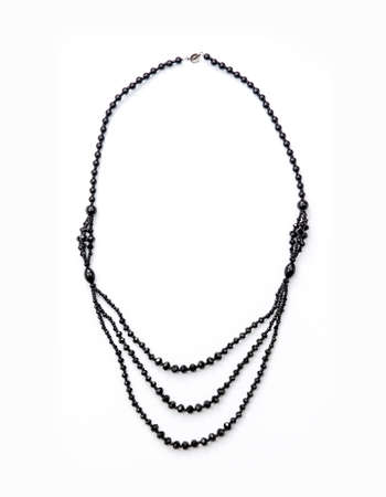 Black stone necklace on white  backgroundの写真素材