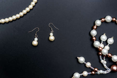 Pearl erring on black background