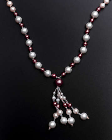Pearl necklace on black backgroundの写真素材