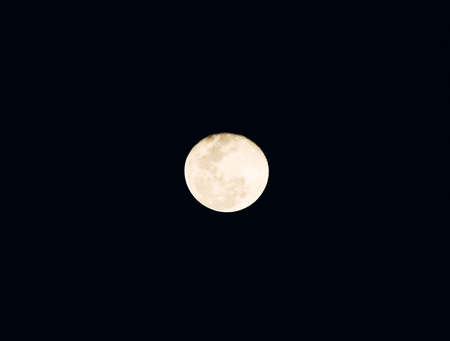 Full moon on the dark night.