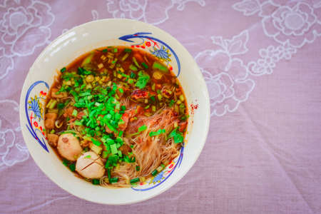 Chinese noodle soup with pork.top viewの写真素材