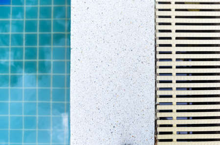 Patten of blue water and floor on swimming pool background.の写真素材