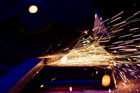 Industry electric fiber cutting steel with beautiful flash of sparks, Building construction concept....