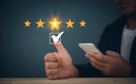 Business man checkmark in the box, the highest satisfaction rating is five stars. rating evaluation...