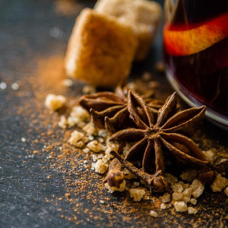 Mulled wine ingredients on dark stone background, closeupの写真素材