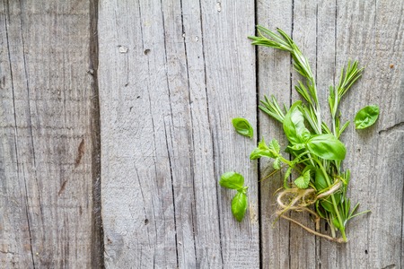 Selection of herbs and spices, rustic wood background, top viewの写真素材