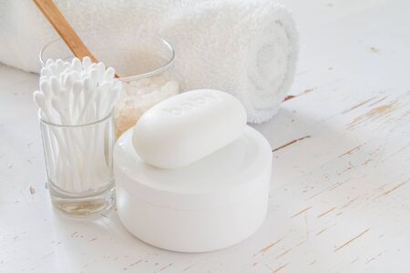 Hygiene and care essentials on white wood backgroundの写真素材