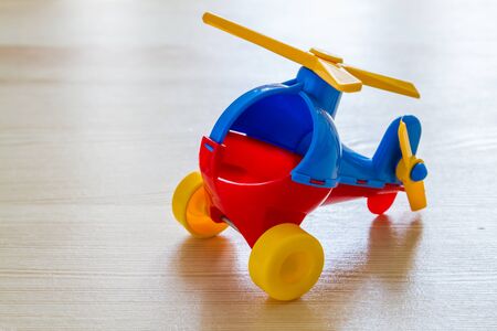 Helicopter on wood background with copy spaceの写真素材