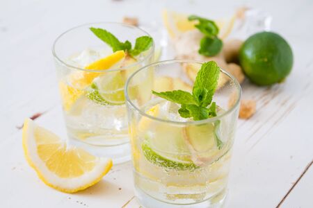 Ginger lemonade ingredients, white wood background, copy spaceの写真素材