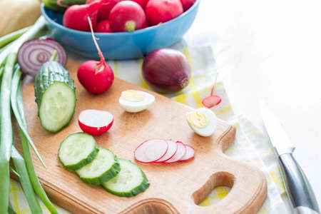 Radish salad ingredients on white wood backgroundの写真素材