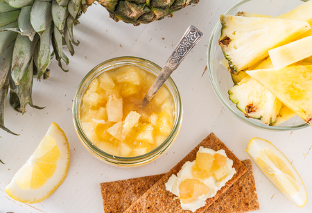 Pear and lemon jam and ingredients, white wood backgroundの写真素材