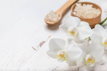 SPA concept with towel and orchid white wood backgroundの写真素材