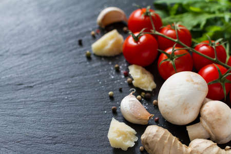 italian background with mushrooms and tomatoes, copy spaceの写真素材
