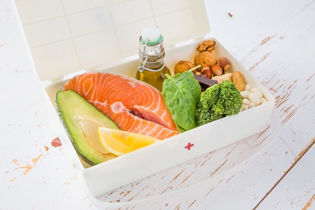 Healthy lifestyle concept - selection of food that is best for your health in  medicine box instead of drugsの写真素材