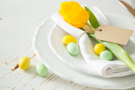 Easter table setting, white wood background, copy spaceの写真素材