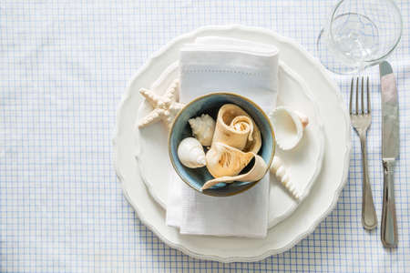 Summer marine style table setting, copy spaceの写真素材