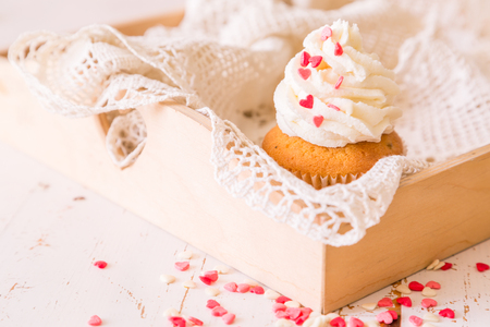 Valentines day concept - cupcakes decorated with pink hearts and coffee, copy spaceの写真素材