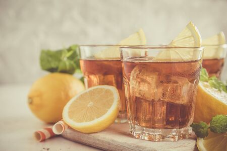 Iced tea with lemon and mint, copy spaceの写真素材