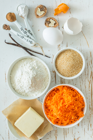 Ingredients for baking carrot cake, wood backgroundの写真素材
