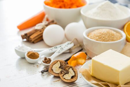 Ingredients for baking carrot cake, wood backgroundの写真素材
