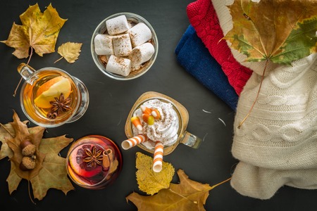 Selection of autumn drinks on wood background, copy spaceの写真素材