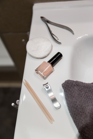 Selection of manicuew accessories in bathroom, towel, copy spaceの写真素材