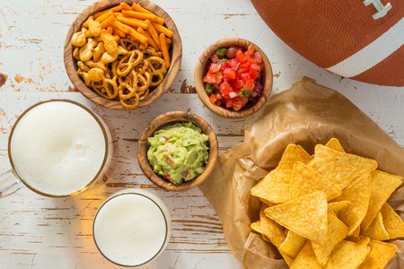 Football party food, super bowl day, nachos salsa guacamole, copy spaceの写真素材