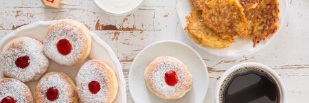 Symbols of Hanukkah celebration on wood background, copy space, top viewの写真素材