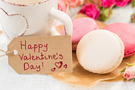 Morning coffee with flowers and macaroons. Mather's day, Valentine's concept. Copy spaceの写真素材
