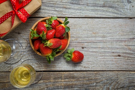 Valentines day concept - champagne, strawberry and presentの写真素材