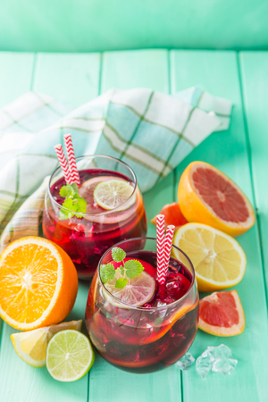 Sangria and ingredients in glassesの写真素材