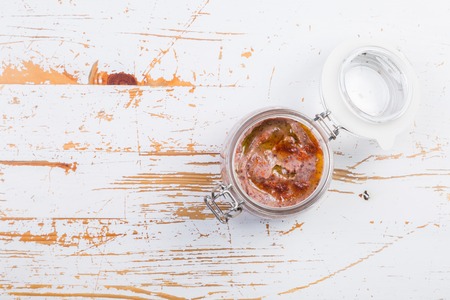 Selection of colorful hummus in jarsの写真素材