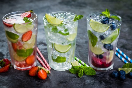 Selection of colorful mojitoes in glassesの写真素材