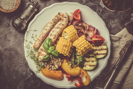 Barbeque sausages with vegetablesの写真素材