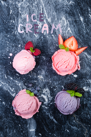 Selection of colorful berry ice cream on marble backgroundの写真素材