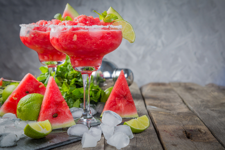 Watermelon margaritas with lime and mintの写真素材