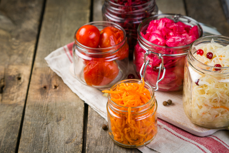 Selection of fermented food - carrot, cabbage, tomatoes, beetroot, copy spaceの写真素材