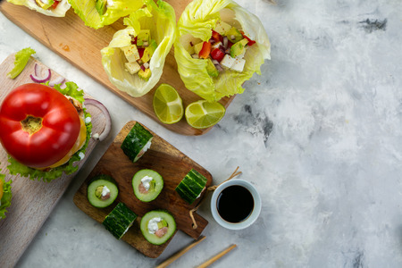 Selection of low carb meal options - burger, taco, sushiの写真素材