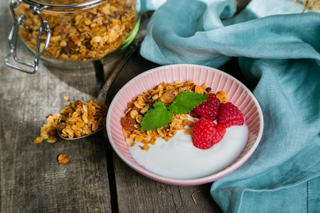 Summer breakfast - granola with strawberries and yogurtの写真素材