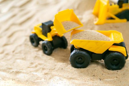 Construction concept - toy model machinery on saldの写真素材